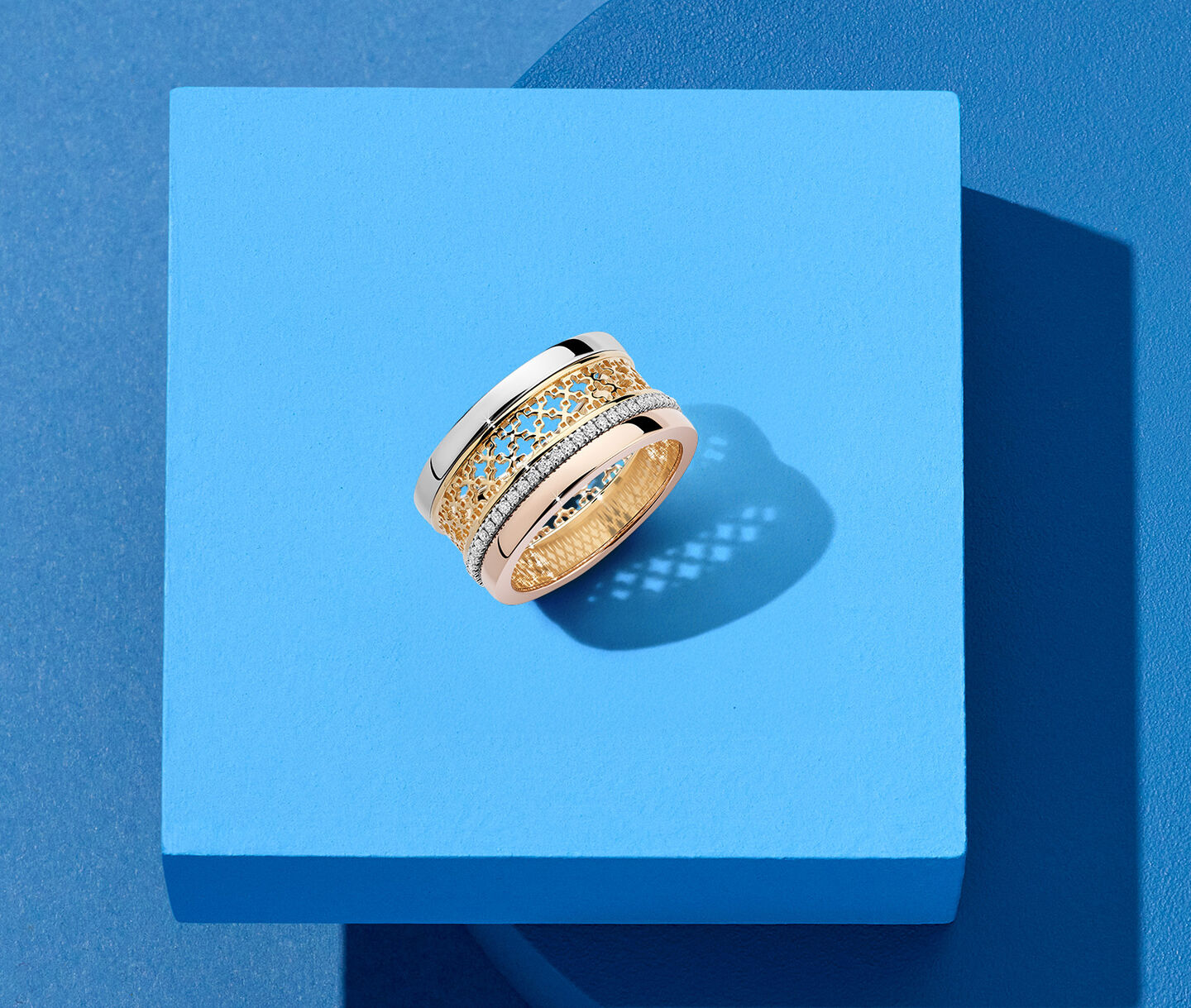 Birks Dare to Dream ring on a blue background.